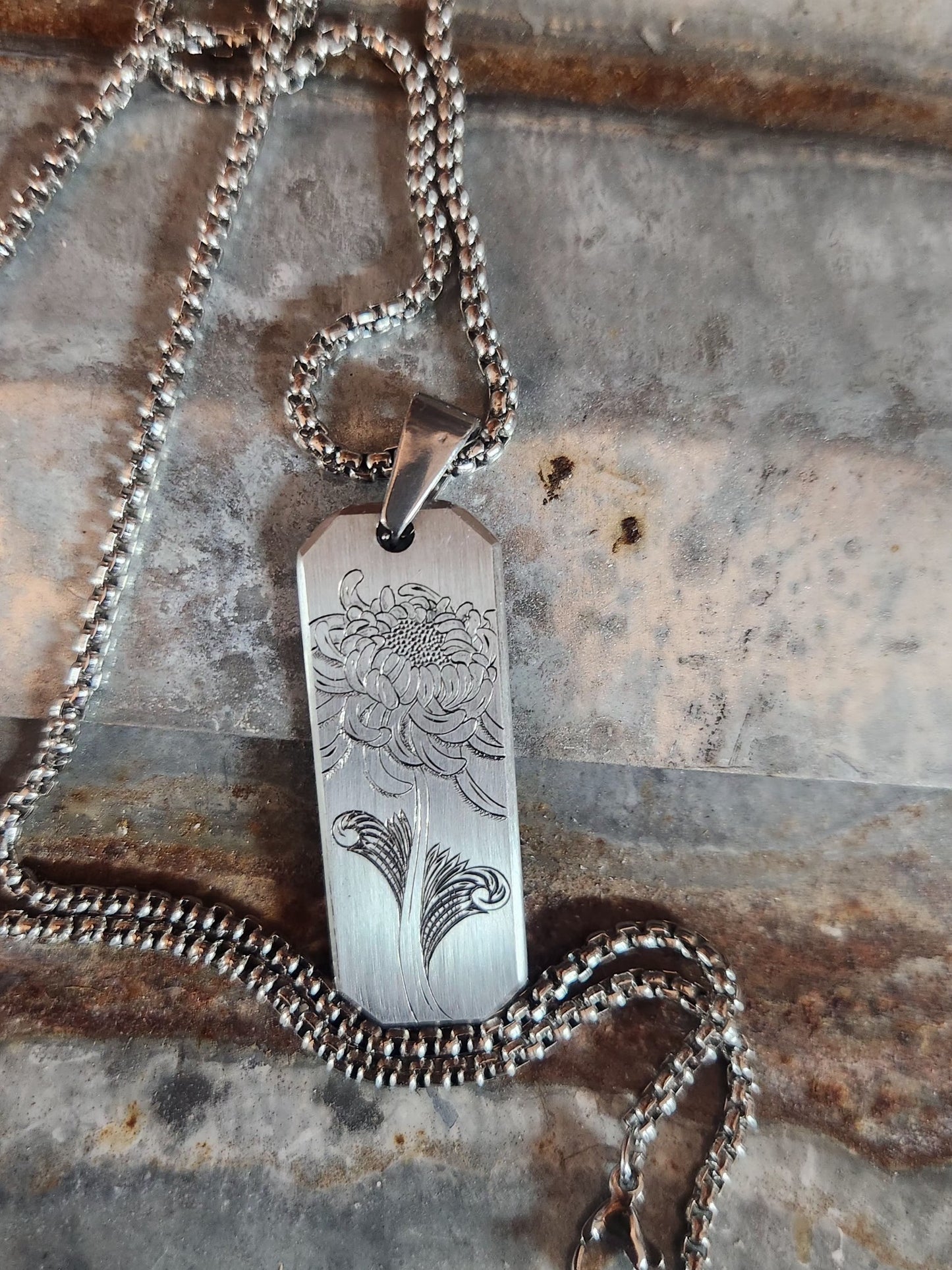 Stainless flower pendant