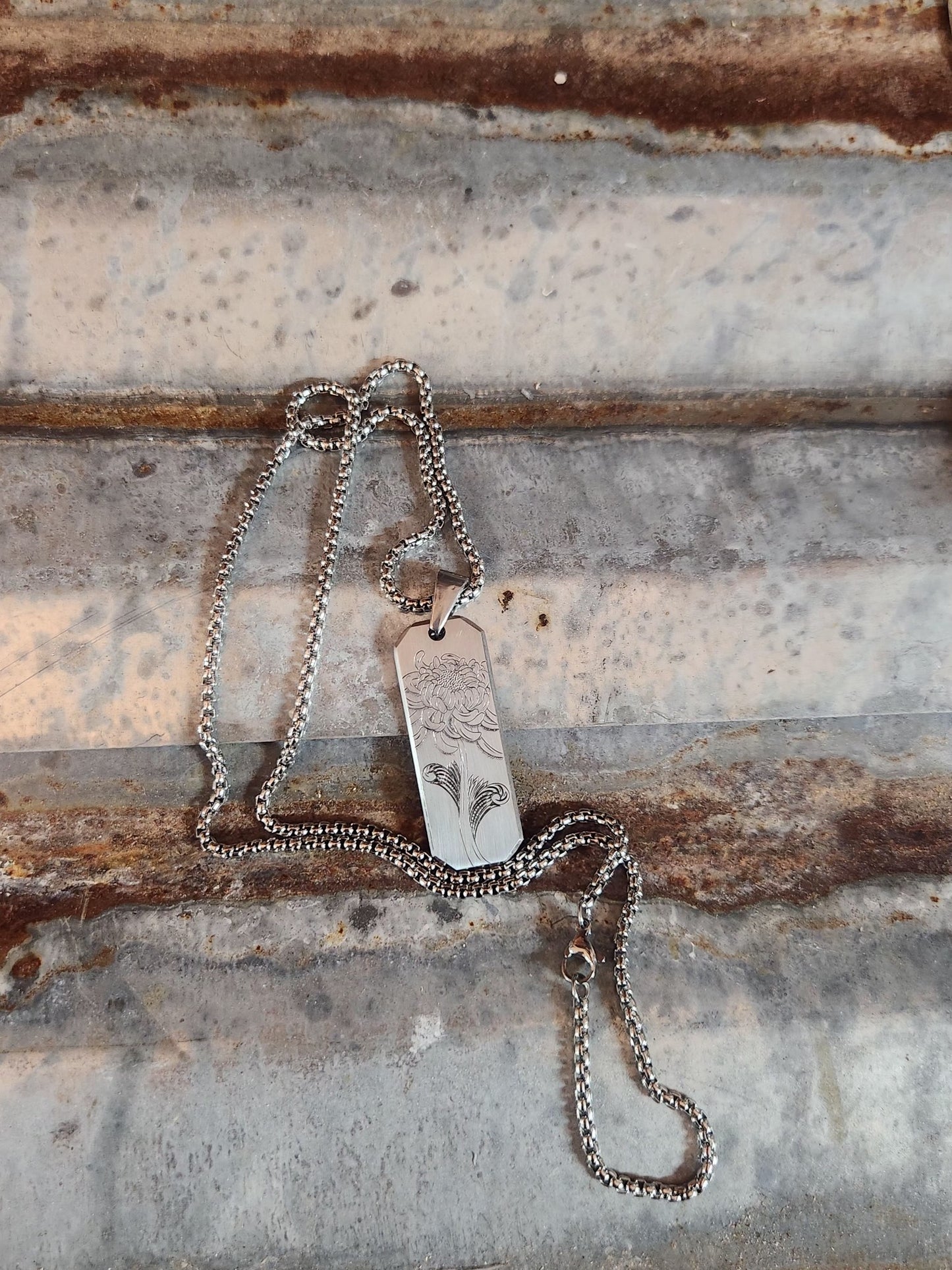 Stainless flower pendant
