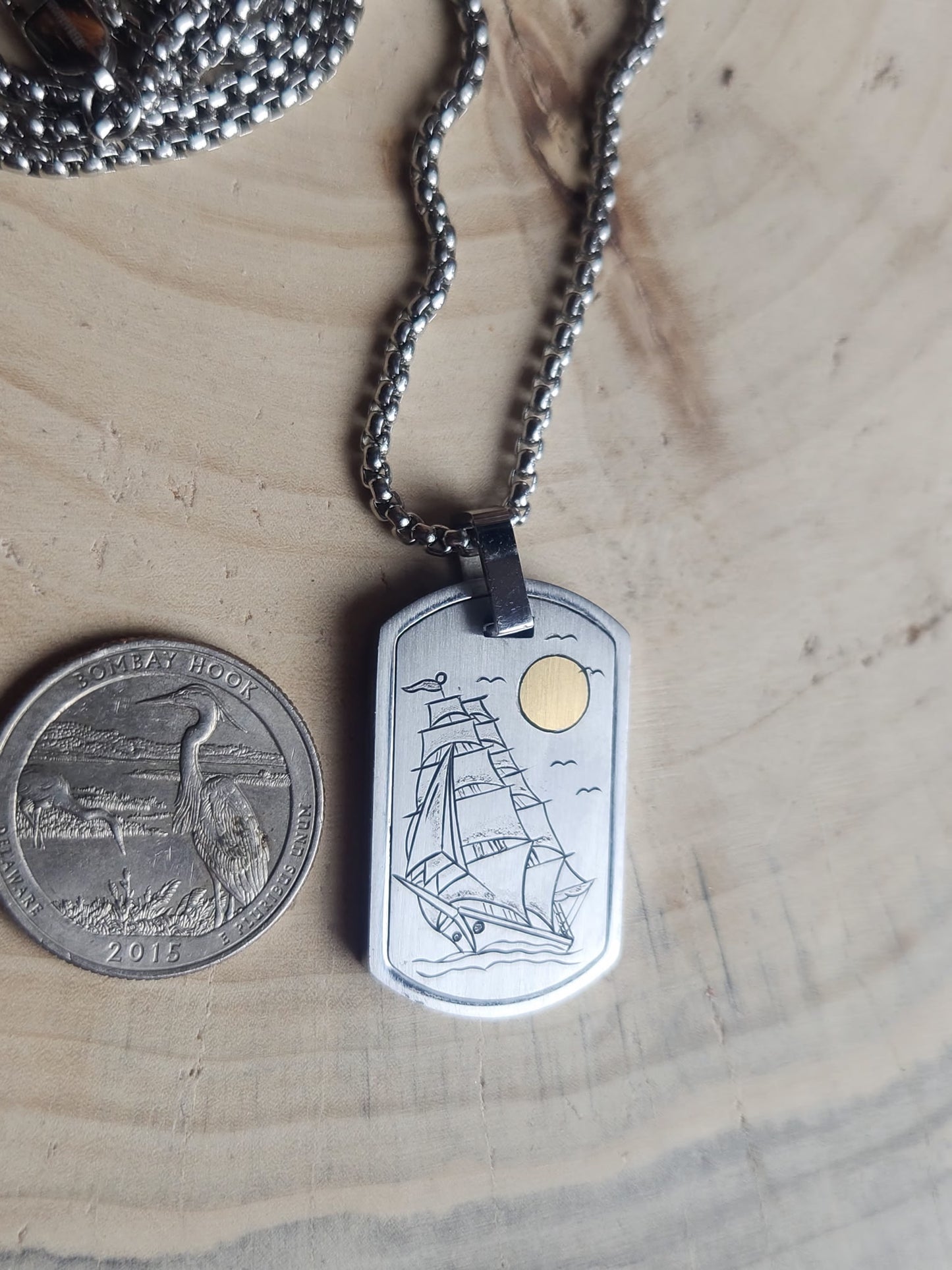 Ship pendant hand engraved with 24k Gold Sun
