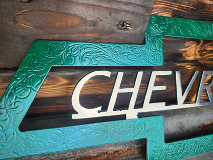 Green and silver Chevrolet sign