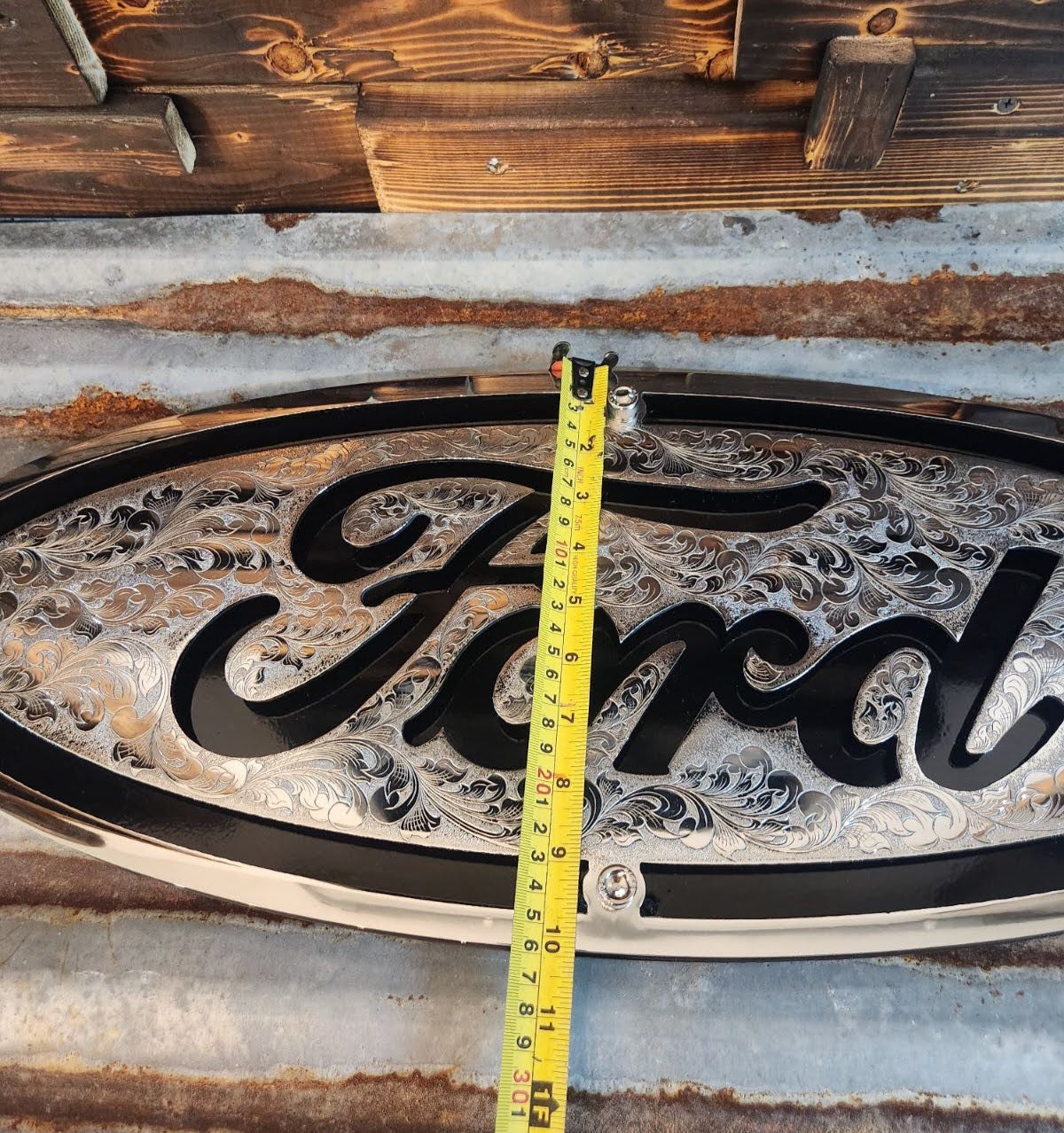 Hand engraved Ford logo sign